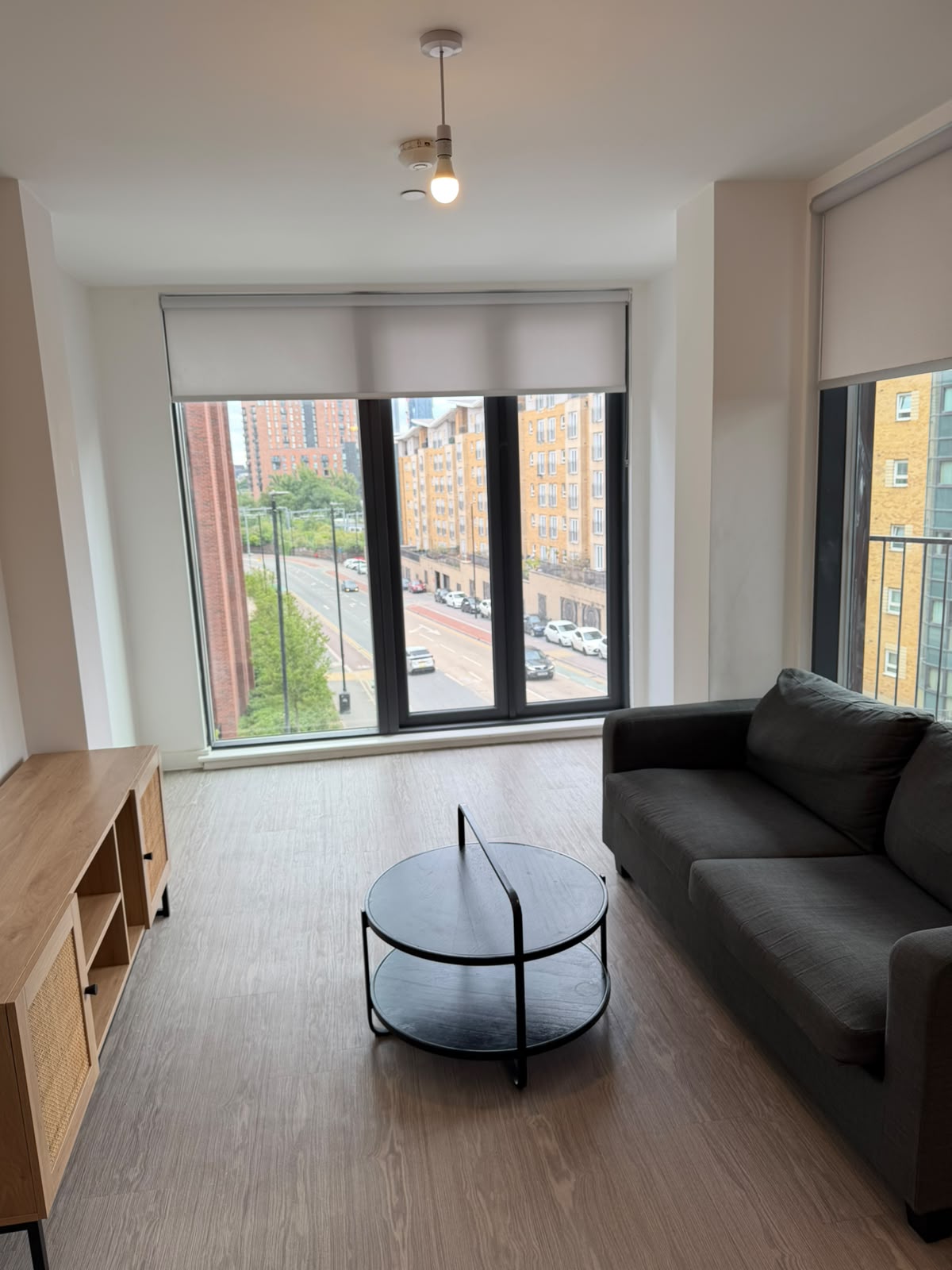 X1 The Landmark — living room with large windows