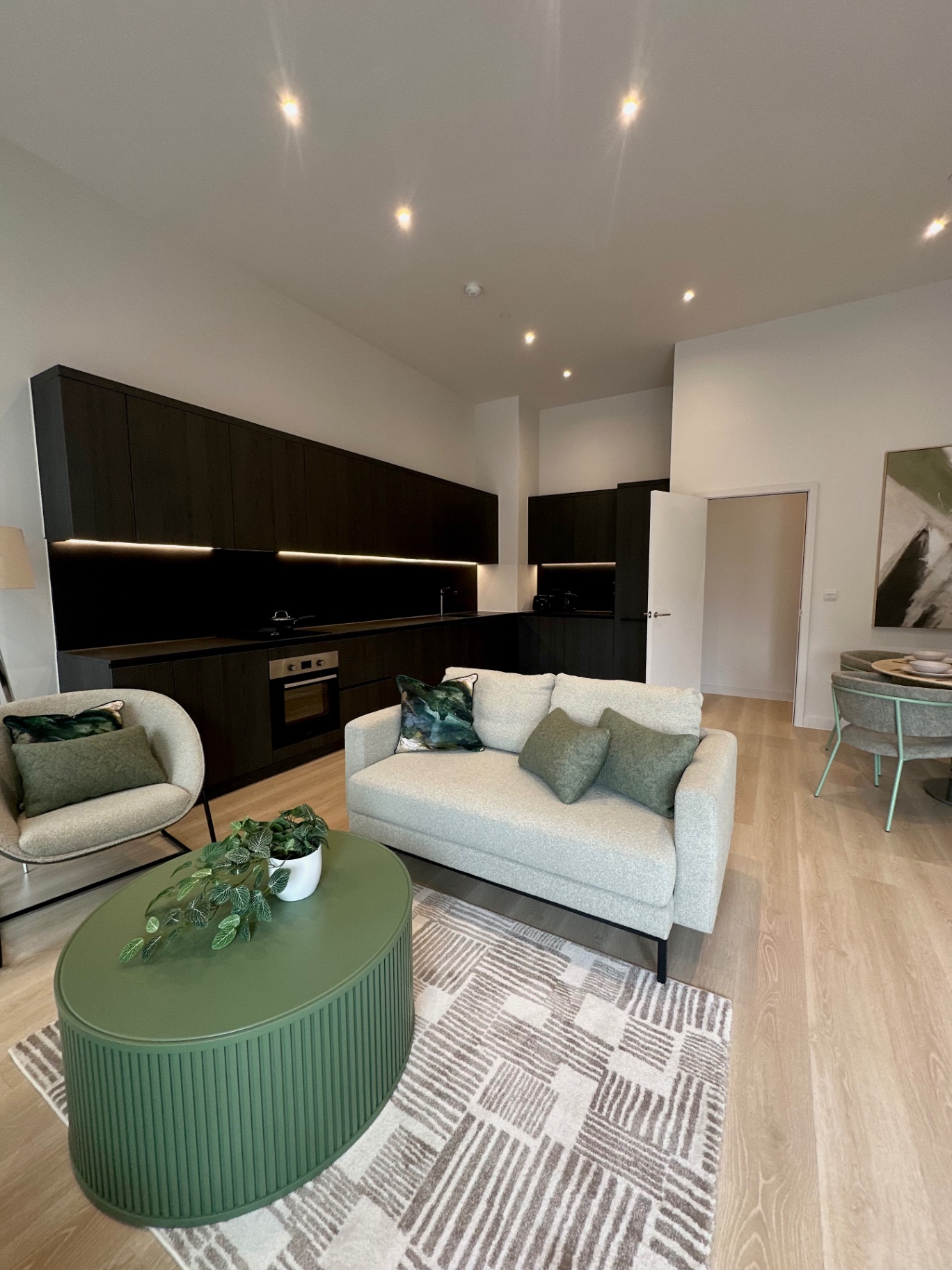 WaterHouse Gardens townhouse — open-plan living, dining and kitchen